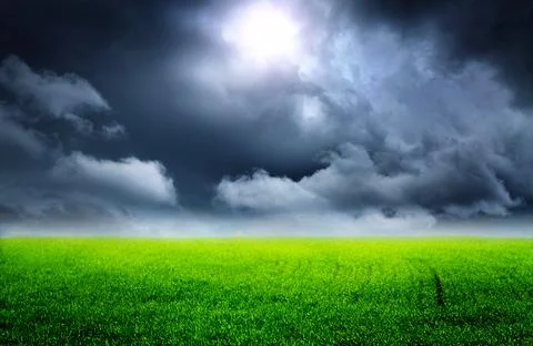 Field and Storm Clouds Stock Photos