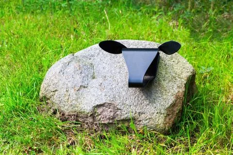 Field boulder as creative sheep artwork Stock Photos