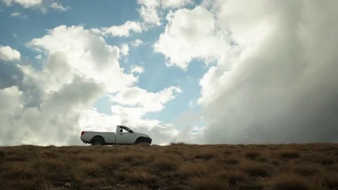 Field Car Drives Over the Mountain Stock Footage 75207129