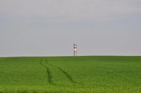 Field with chimney Stock Photos
