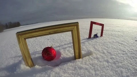 Field with Christmas baubles in frames, time lapse 4K Stock Footage 72162499