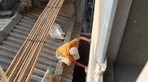 In the field of construction, construction workers Stock Footage 58200871