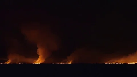 Field Is On Fire At Night Stock Footage 77934843