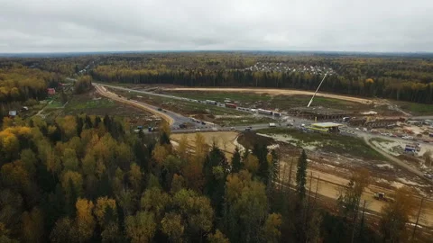 A field in the forest where the road passes. Moscow region repair and expansion Stock Footage 97785535