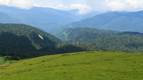 Field on a hill. Time Lapse. Sochi, Russia. 1280x720 Vídeo Stock 53744804