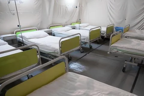 Field hospital tent with beds. Stock Photos
