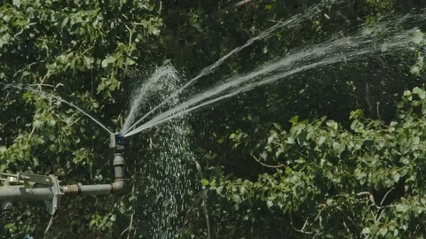 Field Irrigation system 4k slowmotion Stock Footage 125054181