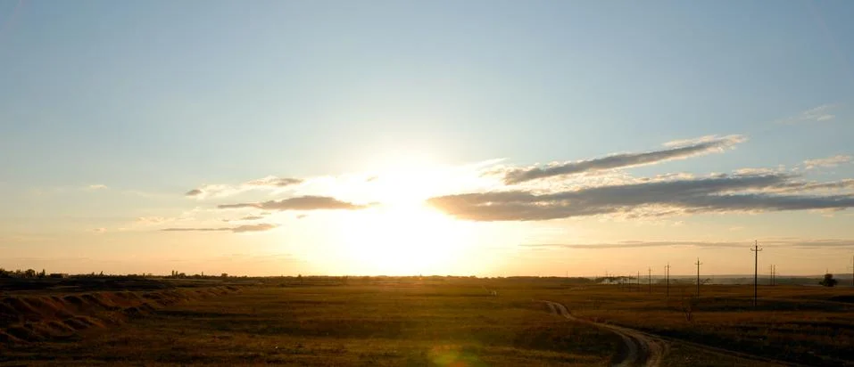 Field in the light of a decline Stock Photos