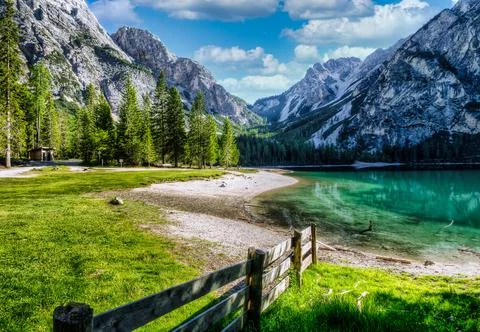 A field with a mountain in the background Stock Photos