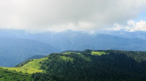 Field in the mountains. Time Lapse. Sochi, Russia. 1280x720 Vídeo Stock 53744913