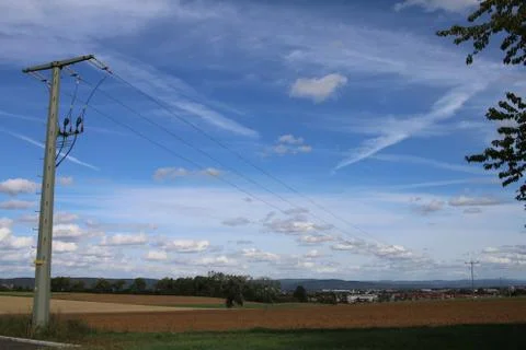 On the field with a nice cloudy sky Stock Photos