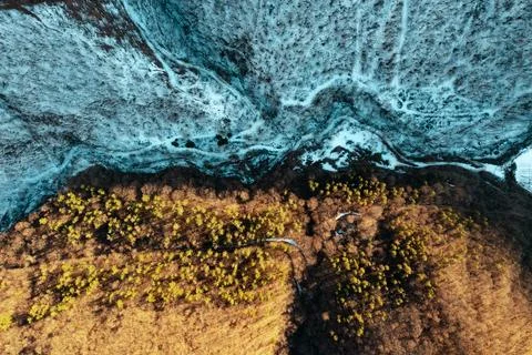 A field, part covered with snow, part not. picture from above Stock Photos