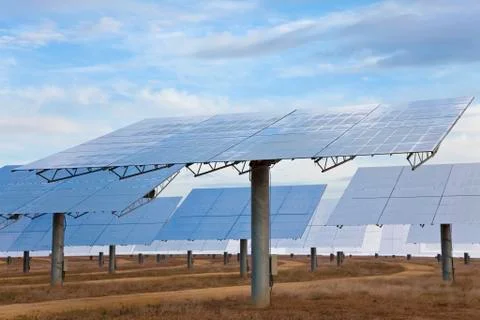 A field of renewable green energy solar mirror panels Stock Photos