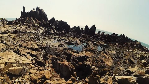 Field of rocks at the end of Arambol Stock Footage 105176497
