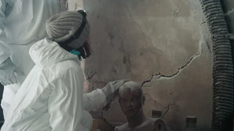Field scientist examining evidence carefully. Forensic investigator in Stock Footage 346522232