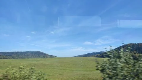 Field sky trees window view travel nature trees summer day Stock Photos