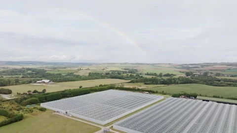 A field of solar panels is shown in the image Stock Footage 297844410