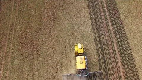 Field with sowing machine. 스톡 동영상 73962341