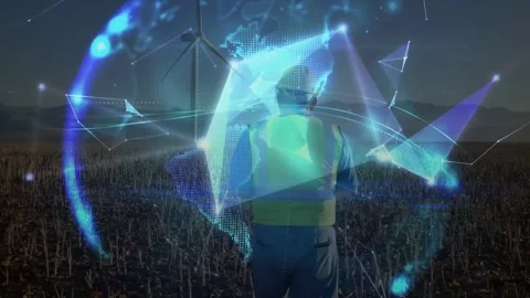 Field tech walking field at dusk causing blue nodes forming globe linking Stock Footage 331757432