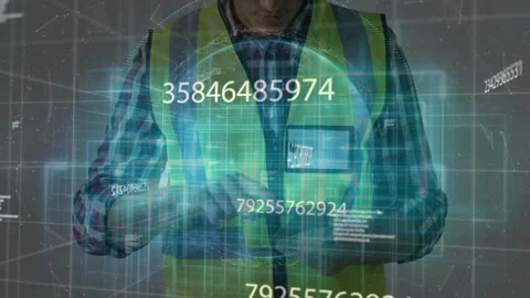 Field technician tapping handheld device and activating 3D HUD while checking Stock Footage 332544799