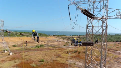 Field technicians repair high-voltage line transformer maintenance work Stock Footage 341098078