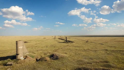 The field for testing. Russia shooting range. Blue sky on background Stock Footage 98777199