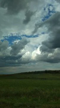Field view on a cloudy day Stock Photos