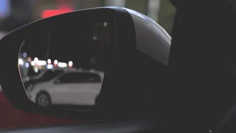 The field of view in the rearview mirror of the car at night Stock Footage 158717436