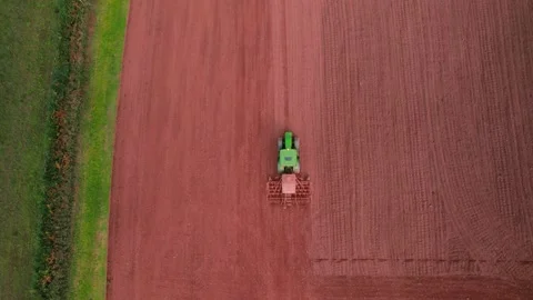 Field work on a tractor from a drone, Devon, England, Europe Stock Footage 161002655