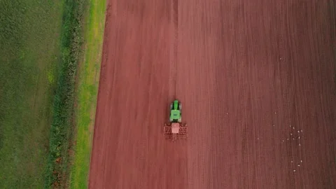 Field work on a tractor from a drone, Devon, England, Europe Stock-Footage 161002973