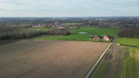 Fields Agriculture Rural Forwards drone aerial local roads farm house trees Stock Footage 233295924