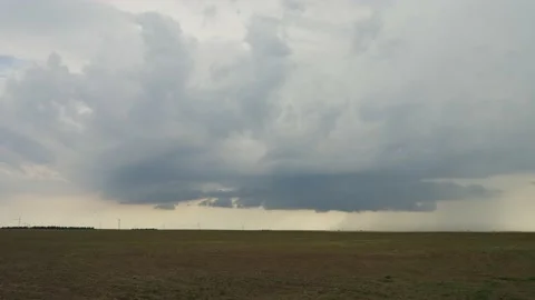 Fields and  a Drifting Day Time Storm Time Lapse Stock Footage 233114459