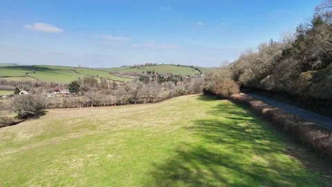Fields and Farmlands over Staverton - English Village from a drone, Totnes Stock Footage 234664330