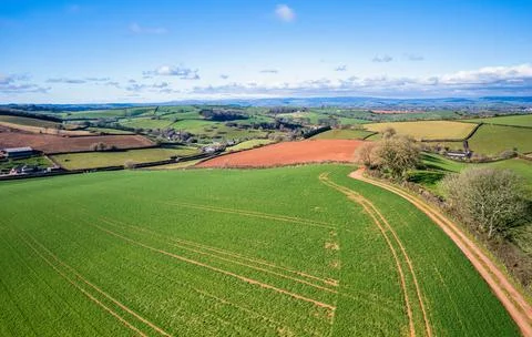 Fields and Farmlands in spring from a drone Devon England United Kingdom Europe Stock Photos