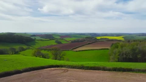 Fields and farms from a drone, Devon, England Stock Footage 239586351
