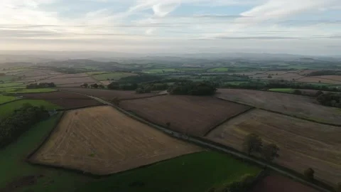 Fields and Farms at evening sun from a drone Torbay, Totnes, Devon, England Stock-Footage 318623331