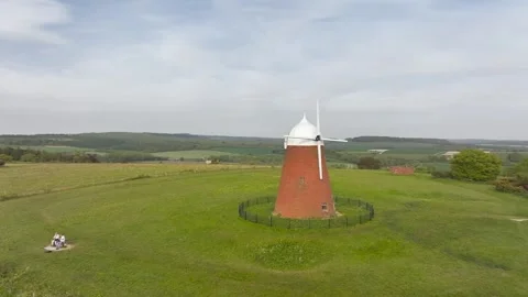 Fields and Farms over Halnaker Hill and the Windmill Trail from a drone, Stock Footage 344826056