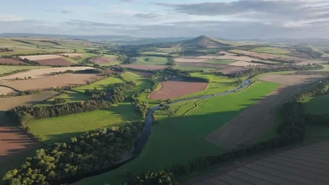 Fields and Farms over River Teviot from a drone, Roxburghshire, Scotland Stock-Footage 317349136