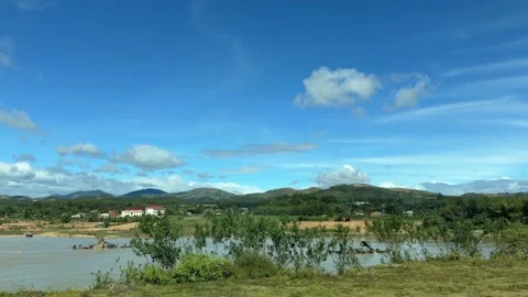 Fields and gentle elevations appear and recede as the camera moves forward Stock Footage 325035017