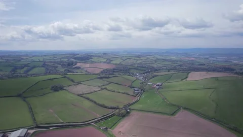 Fields and Meadows over Labrador Bay and Ness Cove Beach from a drone, Devon Stock Footage 174718807