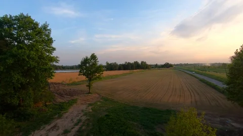 Fields and meadows at the sunny end of the day Stockbeeldmateriaal 89455014