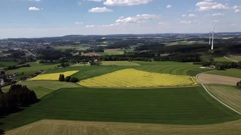 Fields and Wind Turbines Panorama drone shot Stock Footage 335760150