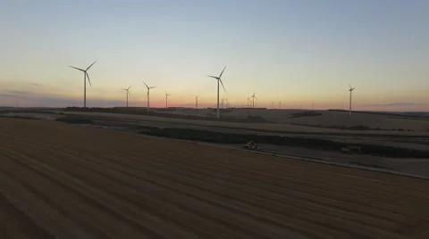 Fields and windmills at sunset. 4K aerial Stock Footage 66444227