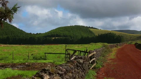 Fields with blue sky and clouds near gruta do Natal in municipality of Praia da Stock Footage 121614928