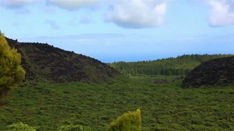 Fields with blue sky and clouds near gruta do Natal in municipality of Praia da Stock Footage 132176033