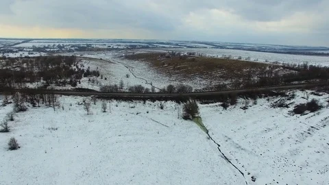 Fields, hilly terrain, Creek. quadrocopter Stock Footage 73096138