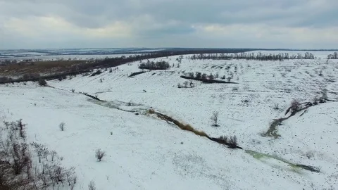 Fields, hilly terrain, Creek. quadrocopter Stock Footage 73096146