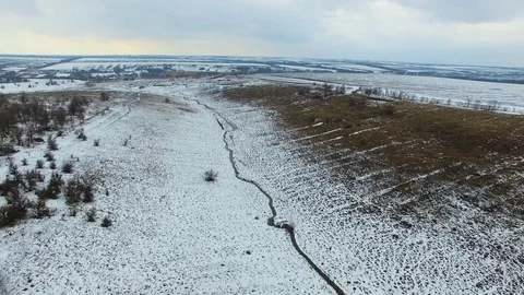 Fields, hilly terrain, Creek. quadrocopter Stock Footage 73096288