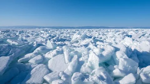 Fields of ice hummocks with heaps of large blocks of ice. Stock Photos