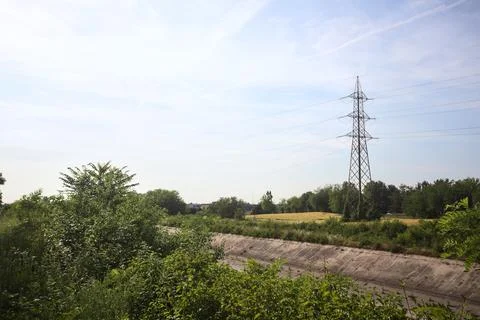 Fields over a channel Stock-Fotos